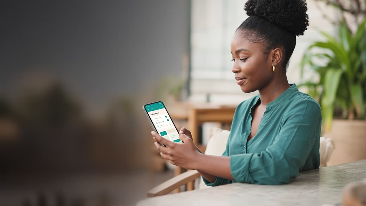 Person using Know2Content on a phone outdoors — simple content planning from a mobile screen